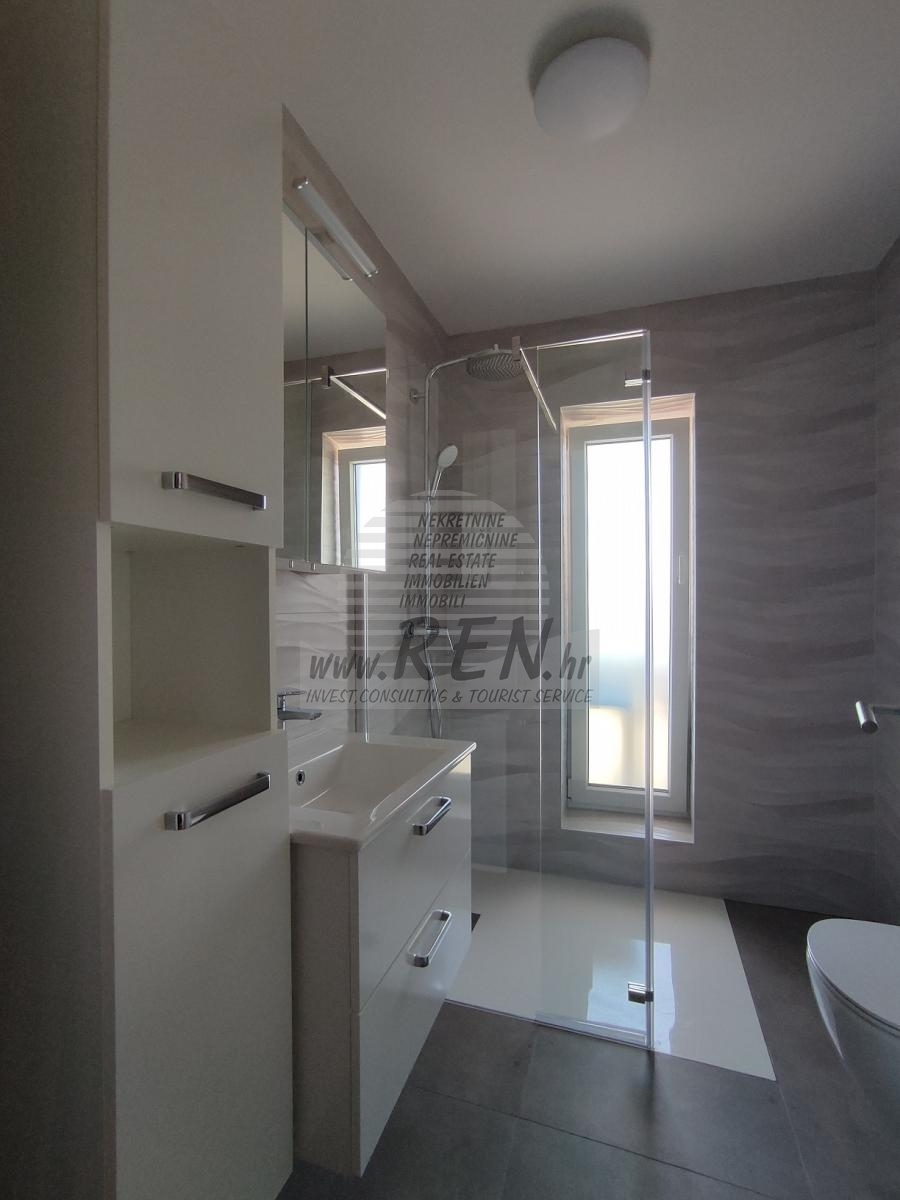 Moderne Wohnung mit großer Terrasse und Meerblick 7