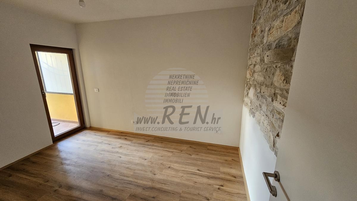 Erdgeschosswohnung mit Garten und überdachter Sommerküche 3