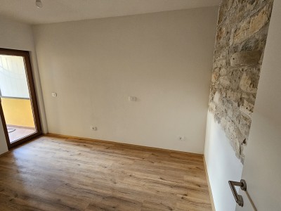 Erdgeschosswohnung mit Garten und überdachter Sommerküche 3