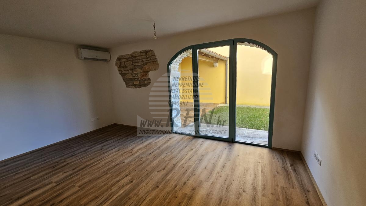 Erdgeschosswohnung mit Garten und überdachter Sommerküche 2
