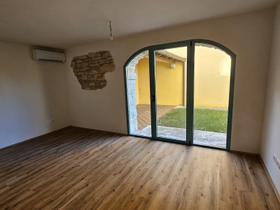Erdgeschosswohnung mit Garten und überdachter Sommerküche 2