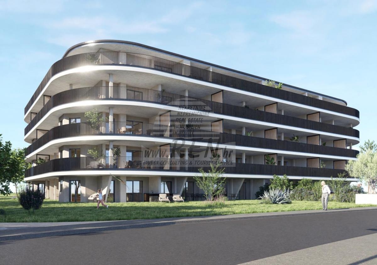 Appartamento di nuova costruzione con giardino privato nel centro di Umago 1