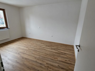 Erdgeschosswohnung mit Garten und überdachter Sommerküche 4